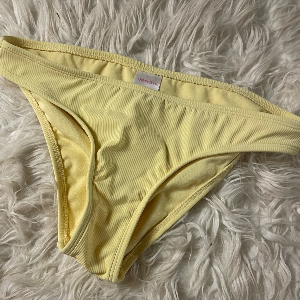 yellow swimsuit bottoms. purchased originally at target. size medium.